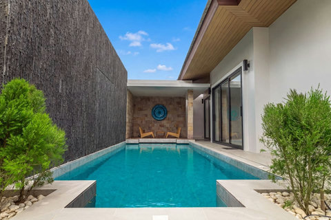 Golden hour magic. Watch the light soften as the sun dips toward the horizon from your poolside.