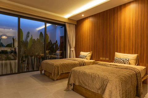 A snug room with twin beds. Kids will love the cozy space, and parents sleep soundly nearby.