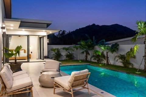 Cook family meals in a light-filled kitchen that opens onto your private garden and pool.