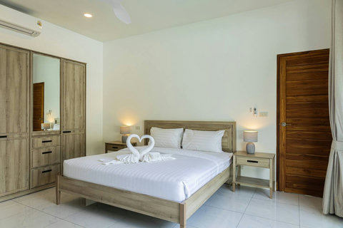 Peaceful and spacious bedroom designed for