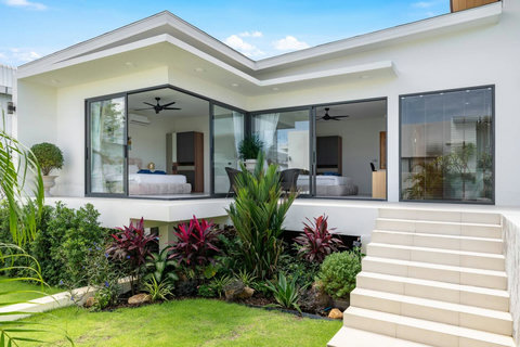 Modern villa entrance with tropical garden and terrace access - 3-bedroom Green Garden Villa Bophut