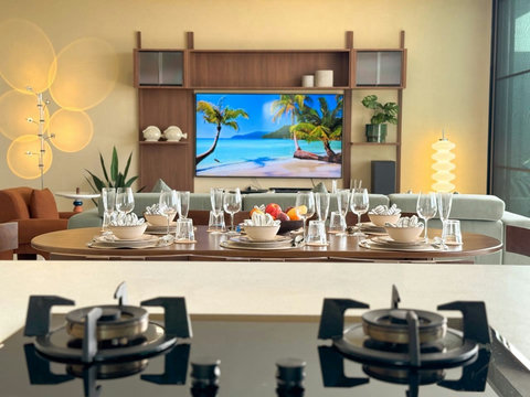 Open-plan kitchen, dining and living area designed for relaxed meals and time together.