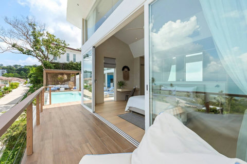 Bedroom 1 private balcony overlooking the pool