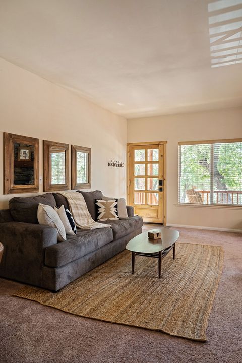All furnishings in the cabin are new as of 2023. Our sofa offers a queen pull-out bed that our cleaners will make on request at booking. I love our sofa. It is roomy and super soft and cozy. My favorite spot to relax.