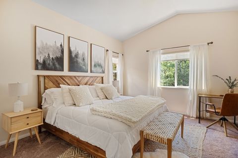 Main room with connecting bathroom. Super spacious with high vaulted ceilings. You can see Sugarloaf Mountain from this room. 