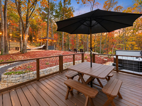 Private deck dining with grill access makes outdoor meals easy and relaxing any time of day.