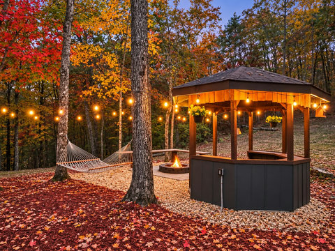 String lights, a fire pit, and a hammock create a memorable outdoor experience for quiet evenings on the ridge.