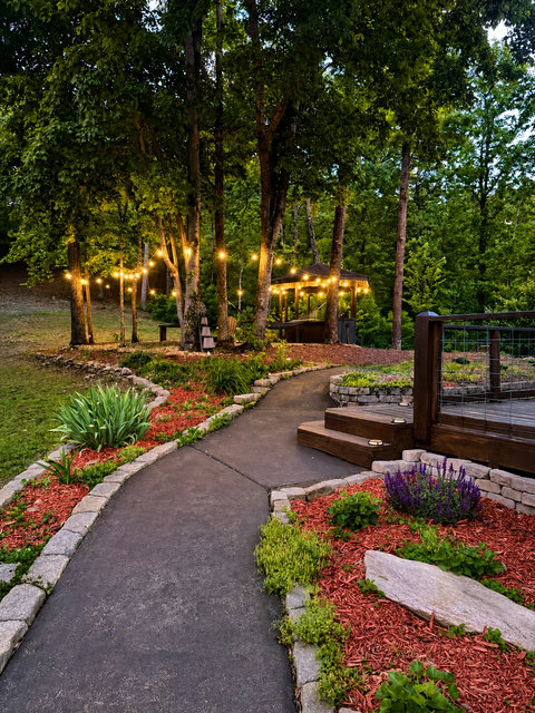 Thoughtfully designed outdoor spaces add to the peaceful, private feel of this Blue Ridge retreat.