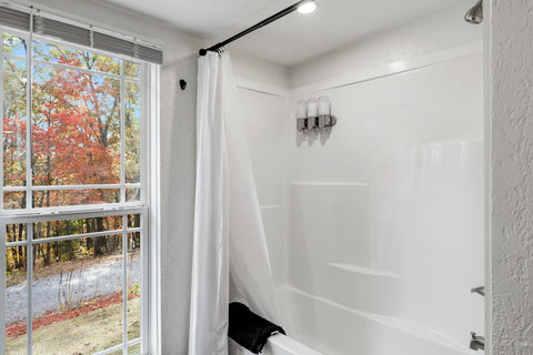Clean, bright, and refreshed — the primary bath adds comfort and convenience to your stay.