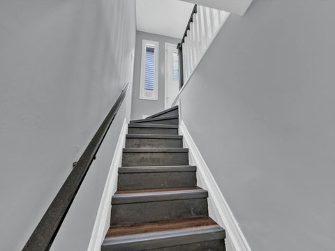 Stairs going up to main floor