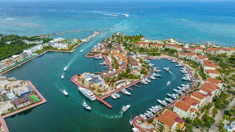 Upscale marina retreat with yacht docks and turquoise sea views