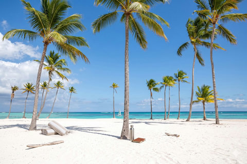 Powder-soft beach with palms and turquoise waters 10 minutes away