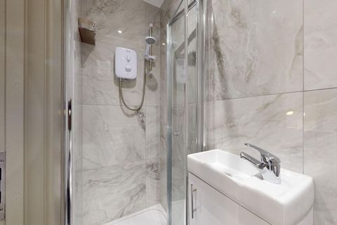 Ensuite Bathroom · Shower · Toilet · Sink