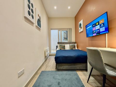 Unwind with a 40" Smart TV, stay connected with WiFi, and enjoy the convenience of a kitchenette with tea & coffee. The private workspace and patio create a perfect blend of comfort and relaxation