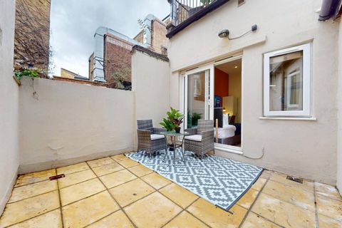 Step out onto your spacious private patio, perfect for relaxing with morning coffee or enjoying an evening drink in the fresh air with comfortable outdoor seating.