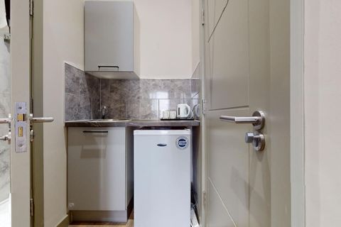 Convenient kitchenette equipped with a fridge, kettle, mugs, and cutlery, along with tea and coffee making facilities—perfect for a quick breakfast or a cozy cup to start or end your day.
