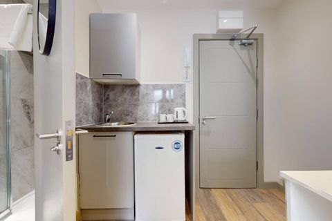 This first-floor room has a homey vibe, with a double bed, Smart 40" TV, WiFi, ensuite, and kitchenette with fridge freezer and tea & coffee setup. Workspace, wardrobe, and hair dryer add convenience to your stay.