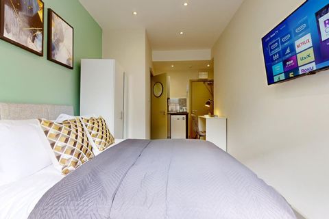 Located on the first floor, this homey space includes a double bed, Smart TV, WiFi, and ensuite. With a kitchenette featuring fridge freezer and tea & coffee, plus workspace, wardrobe, and hair dryer, comfort is built in