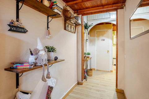 PASILLO ACCESO BAÑO Y COCINA