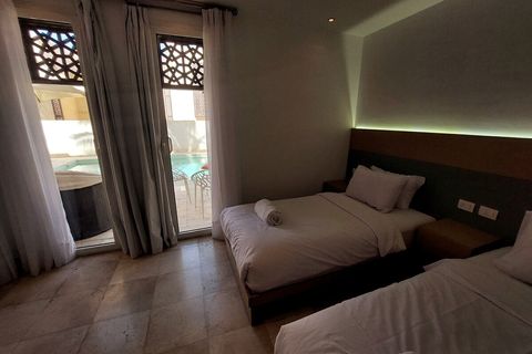 Each en suite room has it's own private bathroom, wardrobe, and smart TV, with  balcony or window overlooking the private pool or the private front yard, Hospitality serviced rooms  housekeeping, laundry, bath supplies, hairdryer, linens and towels