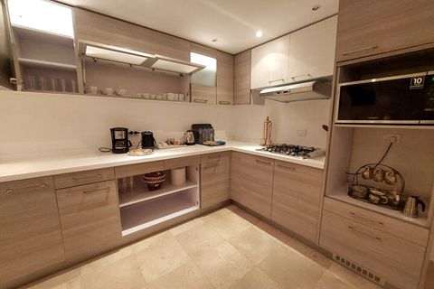 Full equipped shared kitchen with a front yard access door for a sunny breakfast with coffee