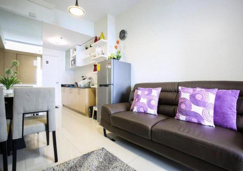 Open plan living room and kitchenette