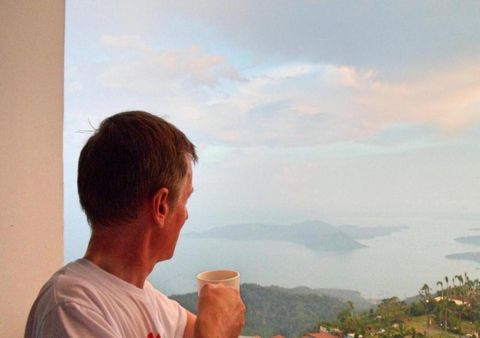 A guest enjoying the view from the balcony