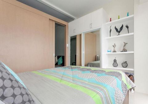 Ample storage space in mirrored wardrobe
