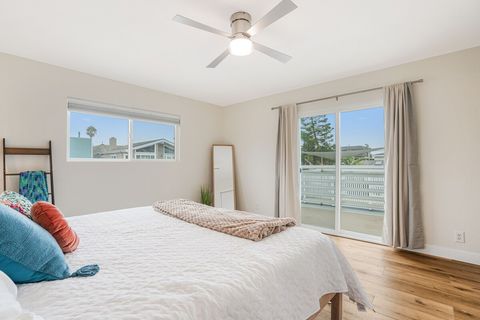 Master king bedroom, faces ocean and opens to patio and ocean breeze. Includes work desk.