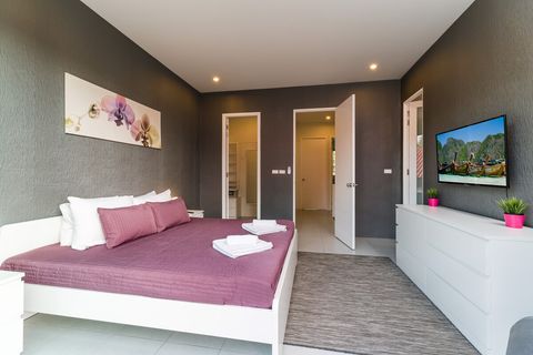 Master bedroom with balcony and private, en-suite bathroom and dressing room.