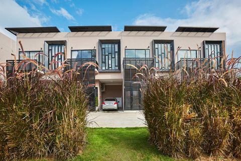 Building exterior. Private parking onsite.