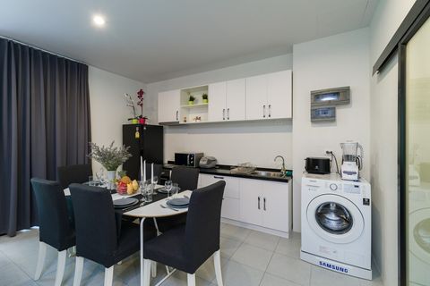 Large kitchen is fully equipped.