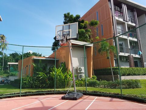 Small basketball field nearby to the house.
