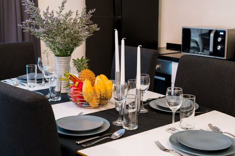 Large kitchen is fully equipped.