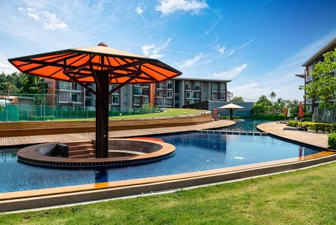 Huge swimming pool has shallow children area.