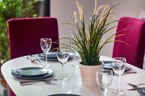 Large kitchen is fully equipped.