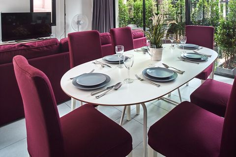 Large kitchen is fully equipped.