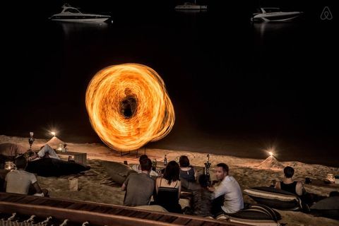 Go down to 'Fisherman's Village' in the evening and watch the 'fire shows' They do them every night.