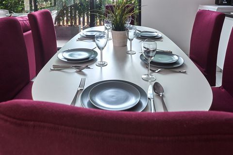 Large kitchen is fully equipped.