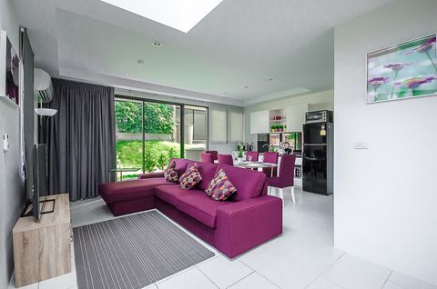 Spacious living room and open kitchen.