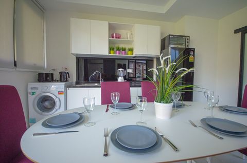 Large kitchen is fully equipped.