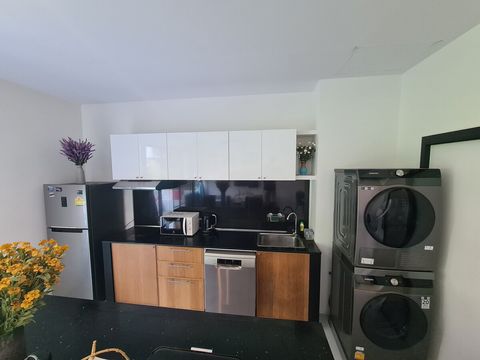 The kitchen includes a dishwasher