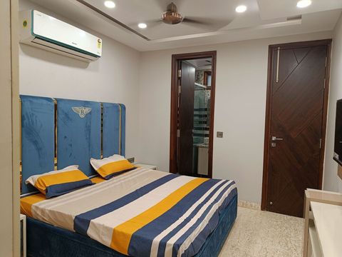 Well set up bedroom with 2 wall to wall almirahs with attached washroom with all imported bath fittings (Grohe), 1.5 tonne AC and smart TV 
