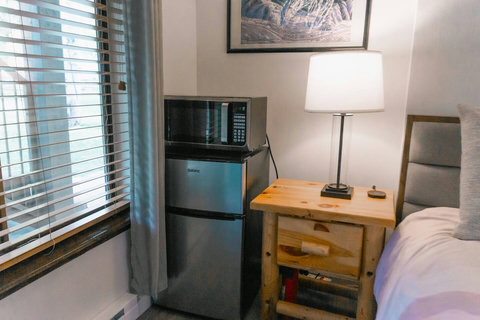 A modest kitchenette including a mini fridge and microwave are available to heat yourself up a snack.