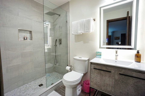 All three bathrooms newly renovated in June 2021. This one is an ensuite attached to the bedroom.