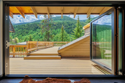 Seamless indoor - outdoor living with high-end doors that open to this expansive view.