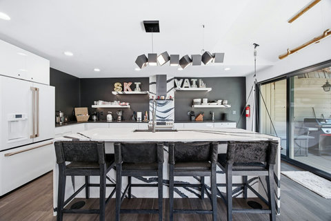 Stylish chef’s kitchen with oversized island