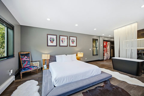 Spacious king suite with soaking tub and stylish boutique design