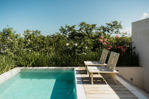 Exclusive terrace offering a private pool and panoramic green vistas