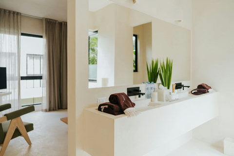 Elegant modern bathroom with a wide vanity